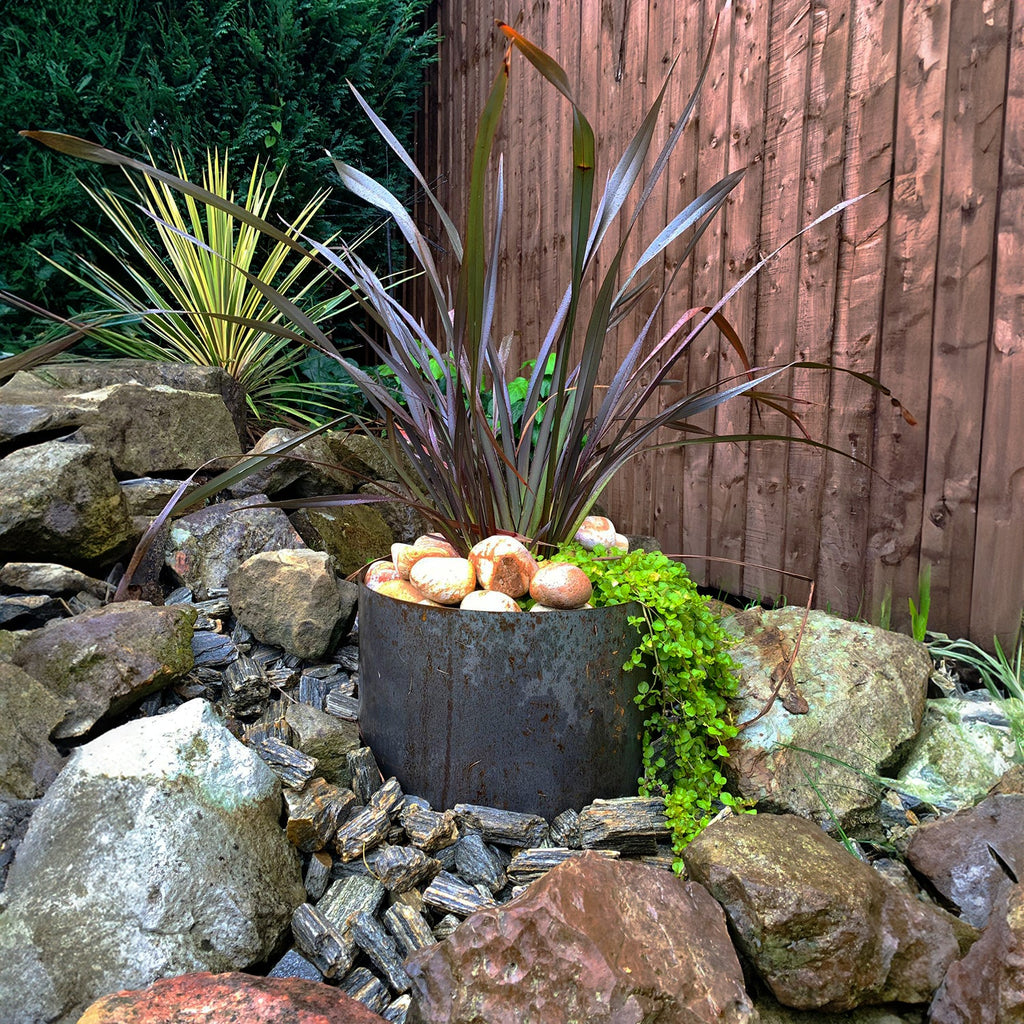 Circular Rustic Steel Planter from Steel Garden Planters